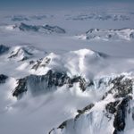 Mountains and glaciers of the Antarctic Peninsula from the air.