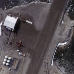 The hangar area at Rothera Research Station showing Dash 7 and Twin Otter aircraft.