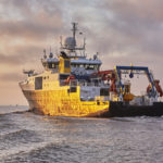 A large ship in a body of water.
