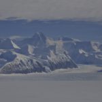 A view of a snow covered mountain.