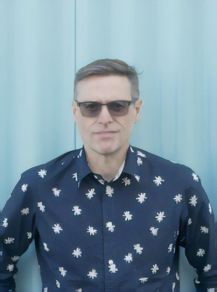 A man wearing glasses