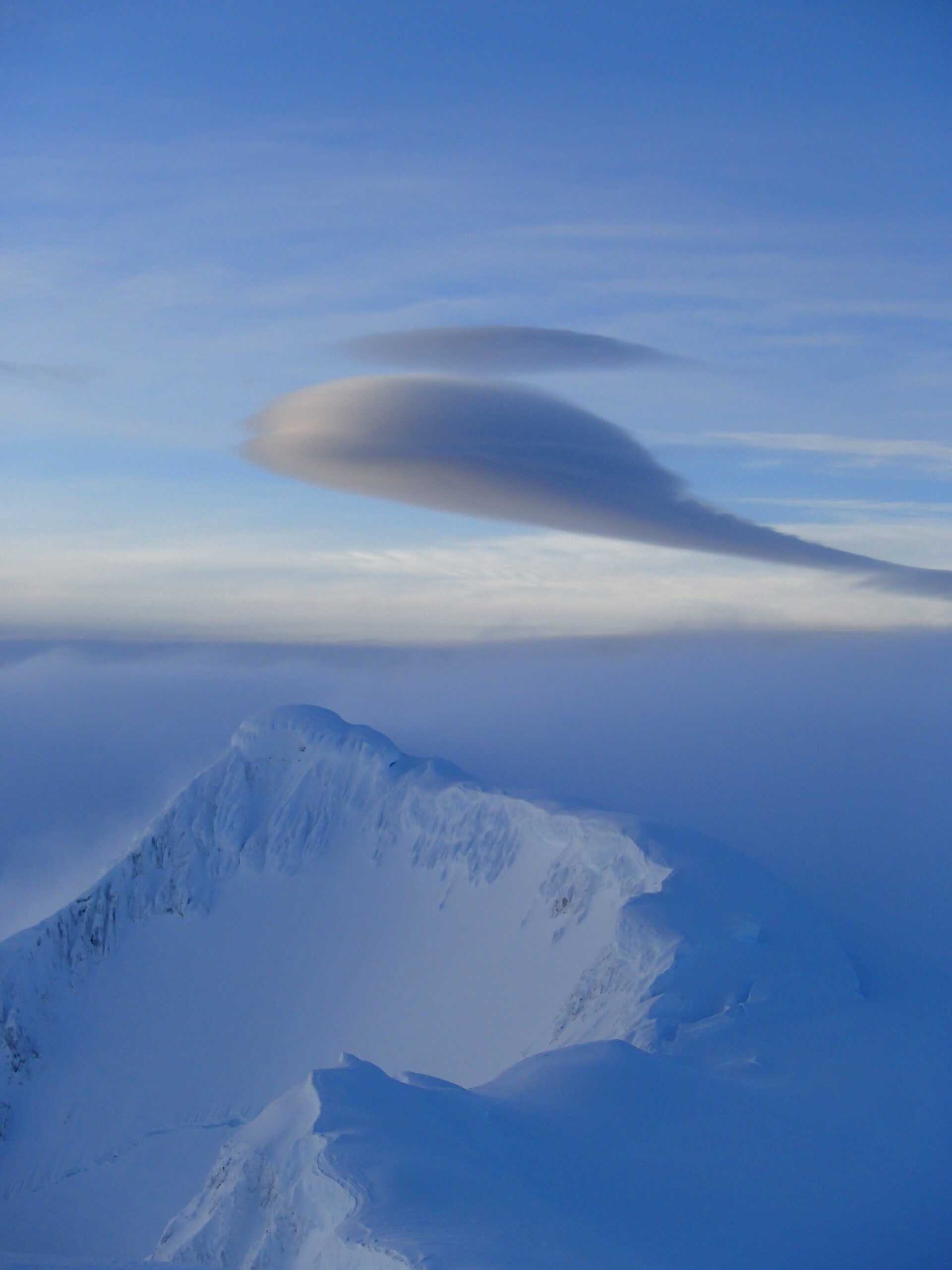 A view of a snow covered mountain