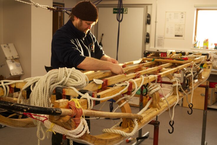 A person preparing food in a kitchen
